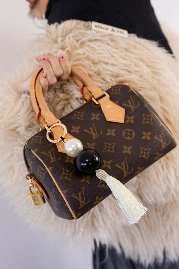 IVORY BAG CHARM WHITE